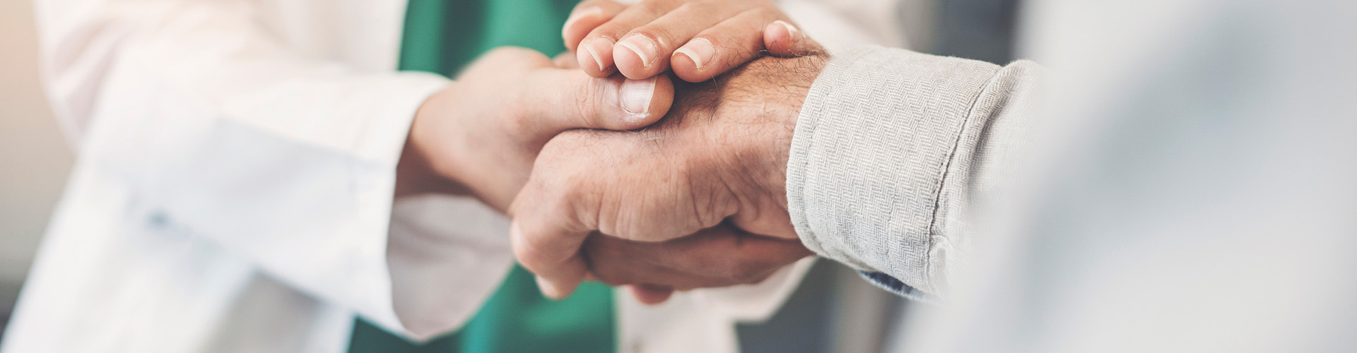A doctor shaking a hand