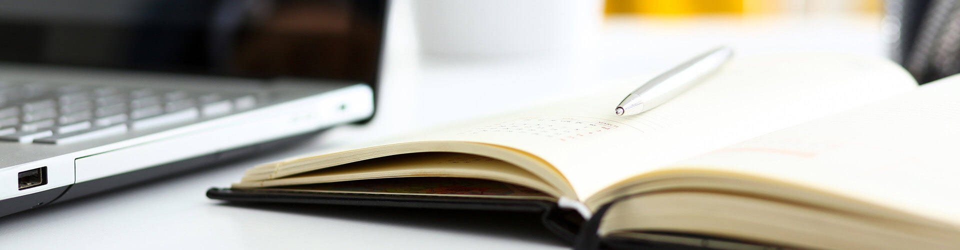 A schedule book rests on a table